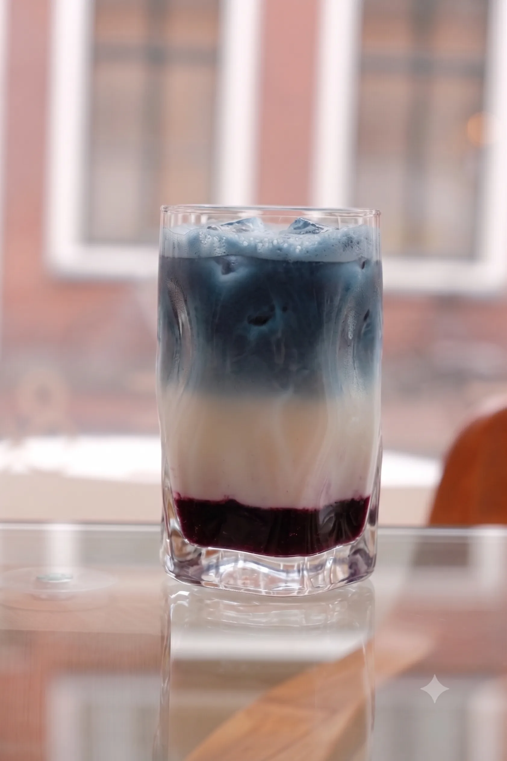 A blueberry matcha drink