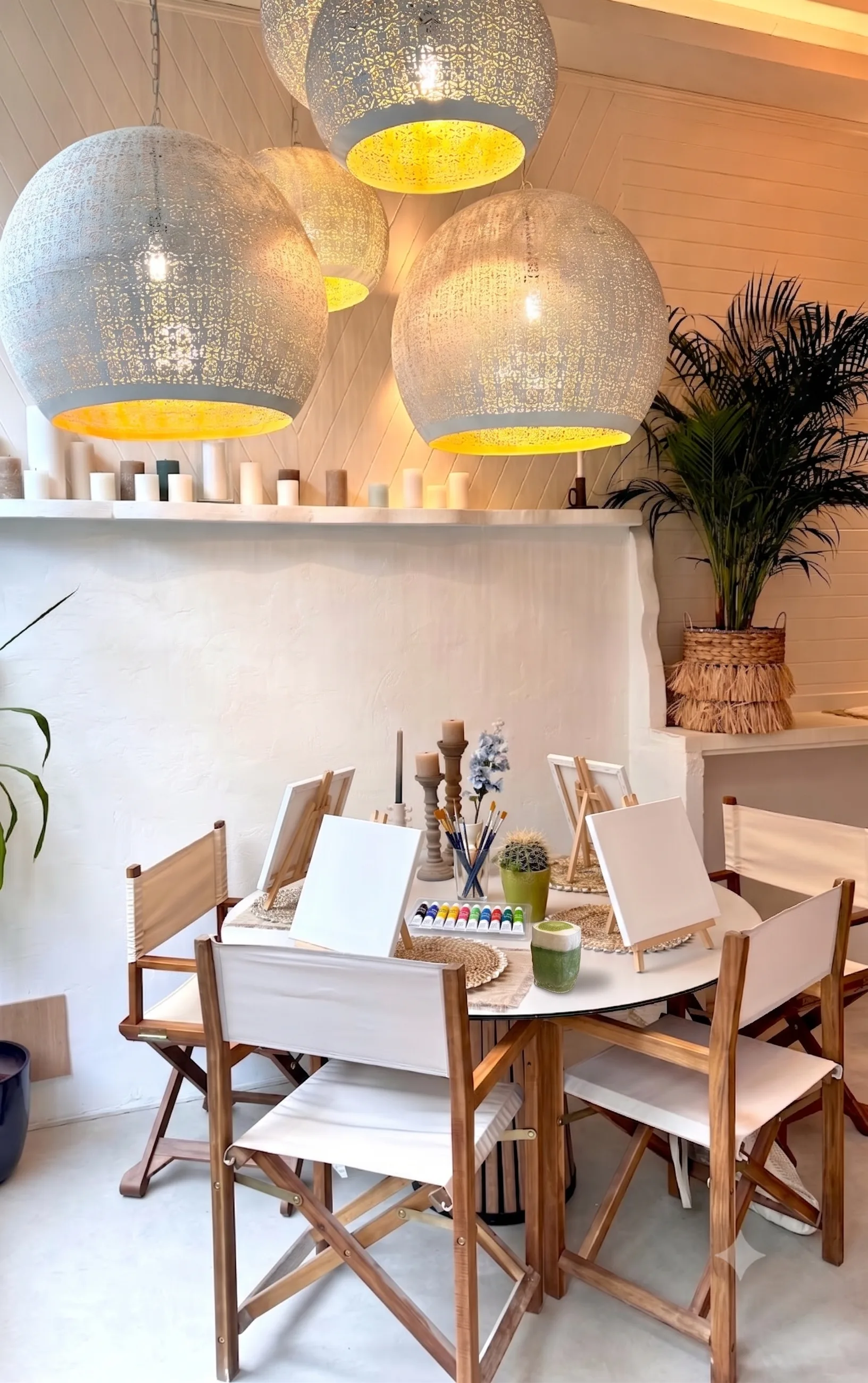 Guests painting together at Table and Chairs
