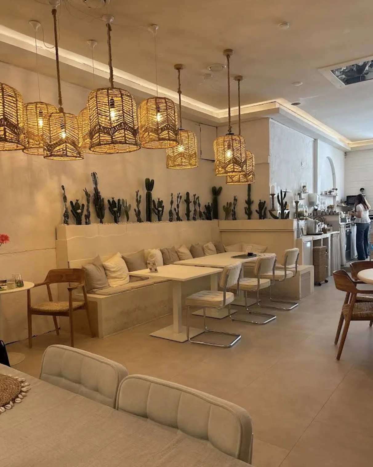 Wide view of the warm interior at Table and Chairs